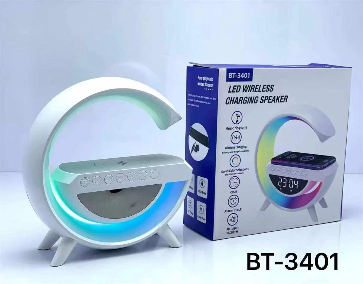 LED wireless charging speaker with colorful display and packaging on a white background
