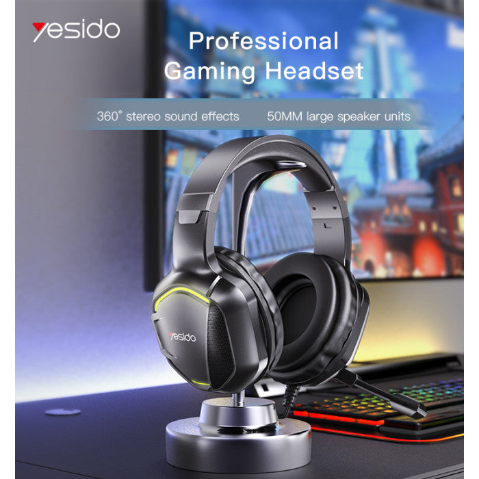 Yesido professional gaming headset on a stand with a blurred gaming setup in the background
