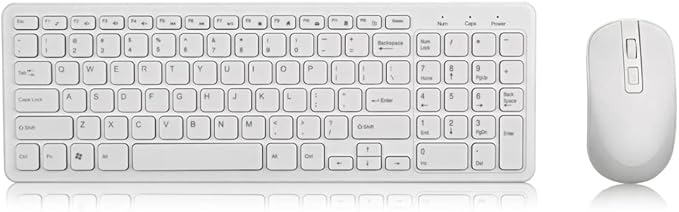 White keyboard and mouse set on a reflective surface