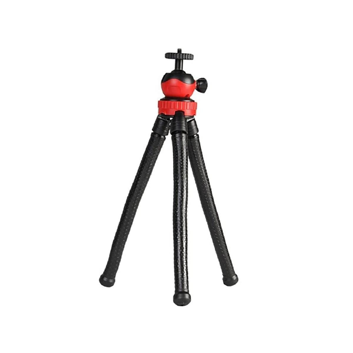Black and red camera tripod on a white background