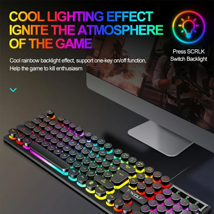Gaming keyboard with RGB lighting effects in front of a computer monitor.