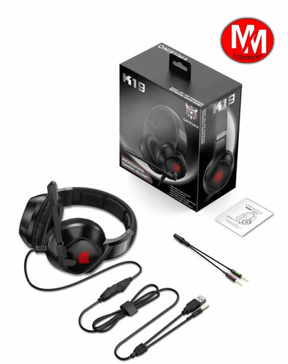 Black gaming headset with accessories and packaging on a white background