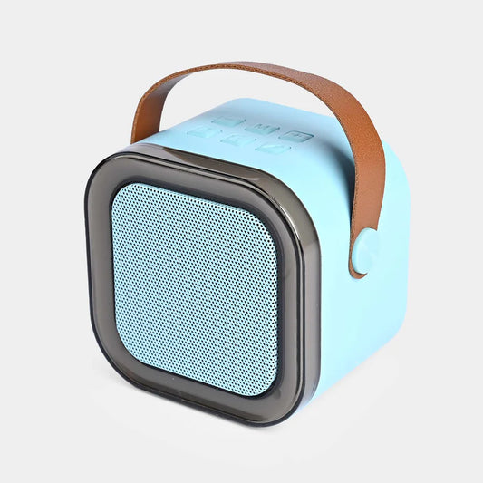Portable blue speaker with brown handle on a light gray background