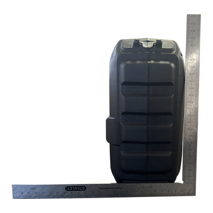 Black fuel tank with a ruler for scale on a white background