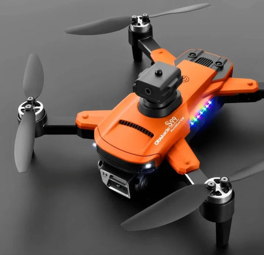 Orange drone with propellers on a dark background