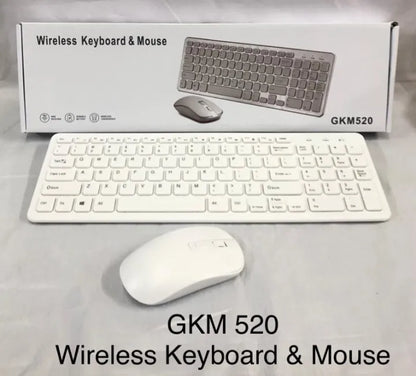 White wireless keyboard and mouse set with packaging on a light gray background
