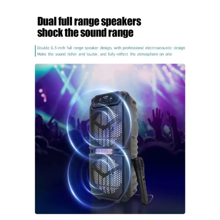 Portable speaker with dual full range speakers on a dark background with colorful lights and silhouettes of people.