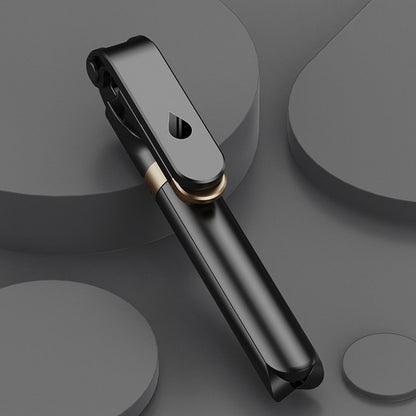 Black and gold Bluetooth headset on a dark gray background
