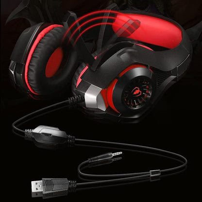 Black and red gaming headset with USB cable on a black background